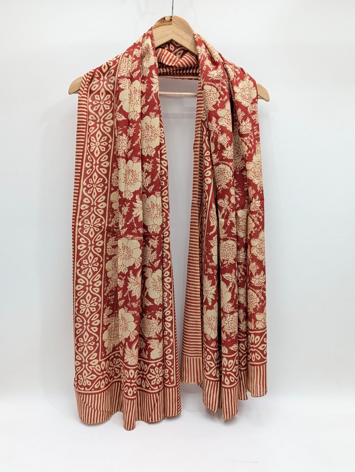 Red ethnic motif mul cotton stole with floral print