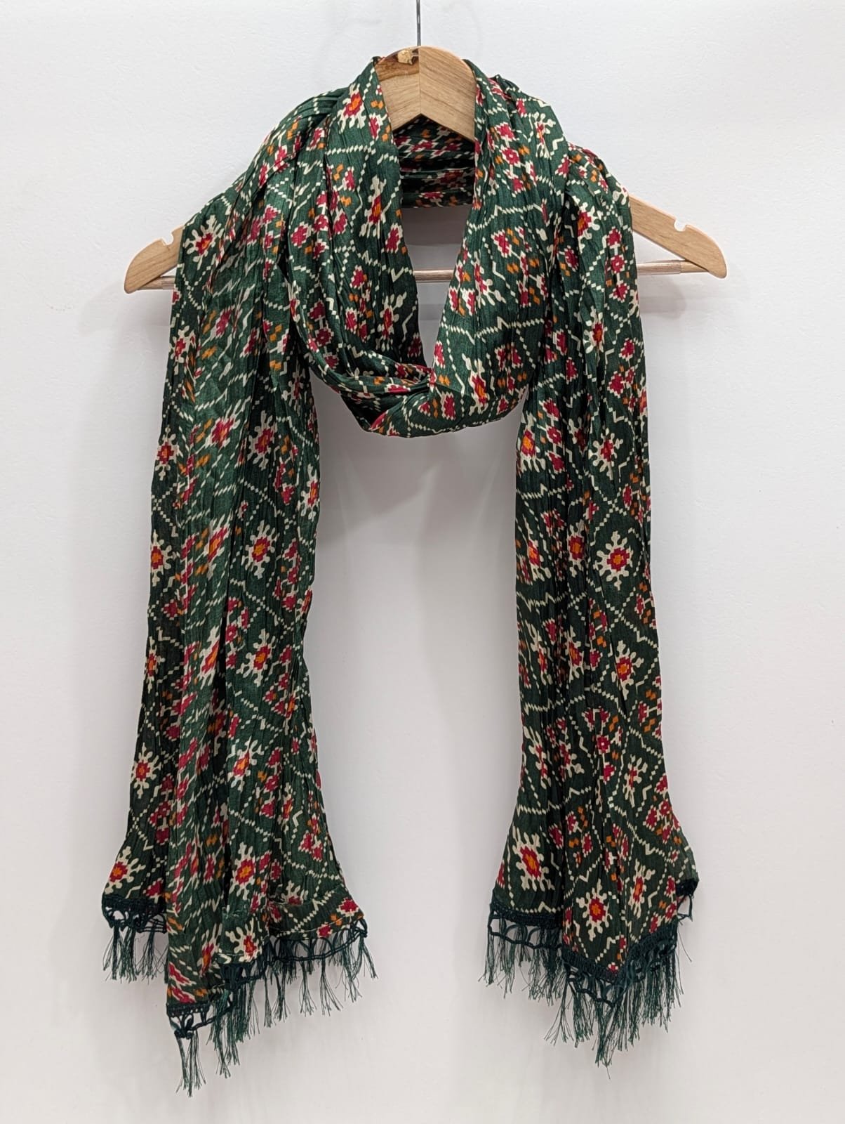 Green ethnic motif printed stole with tassels