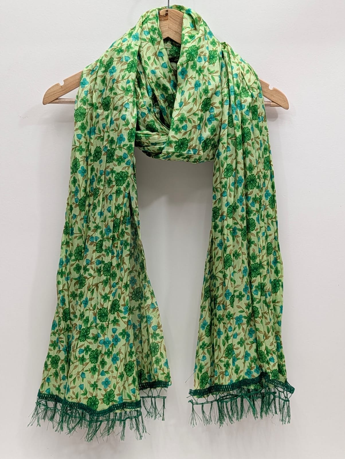 Green floral printed synthetic stole with tassels