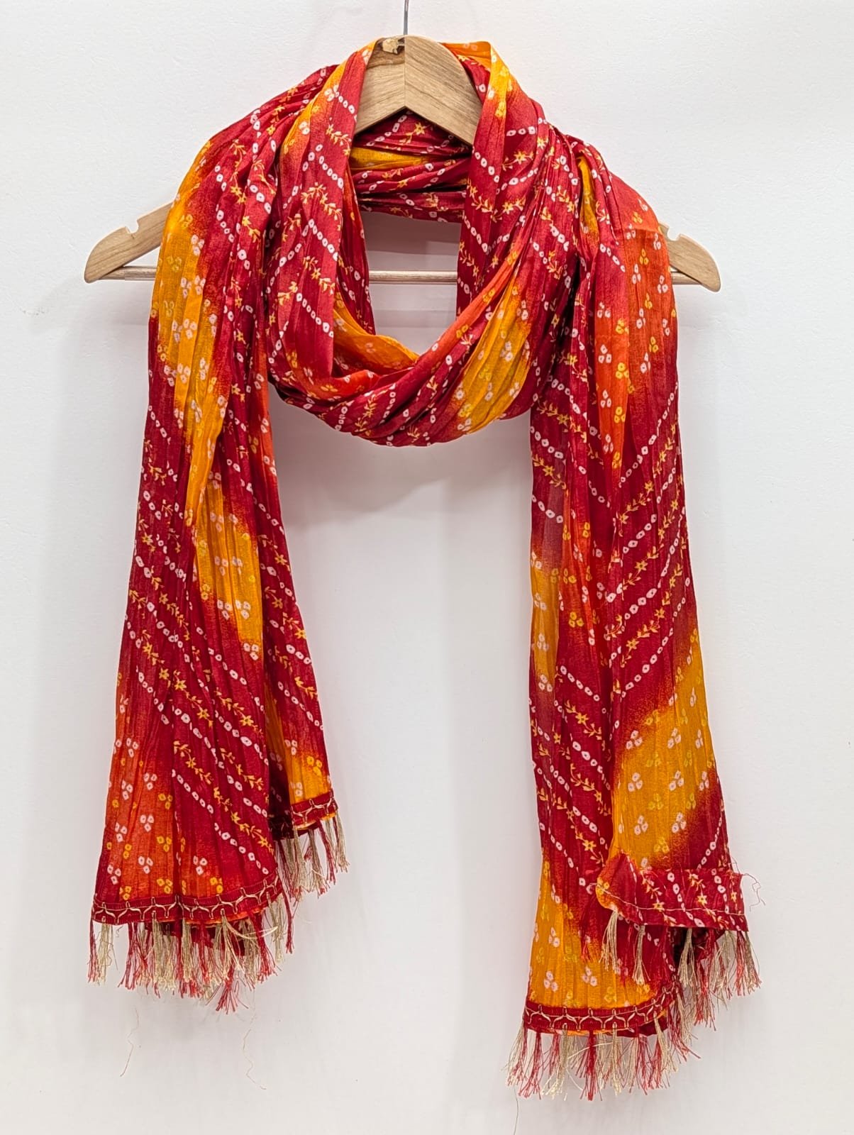 Orange bandhani printed stole with tassels
